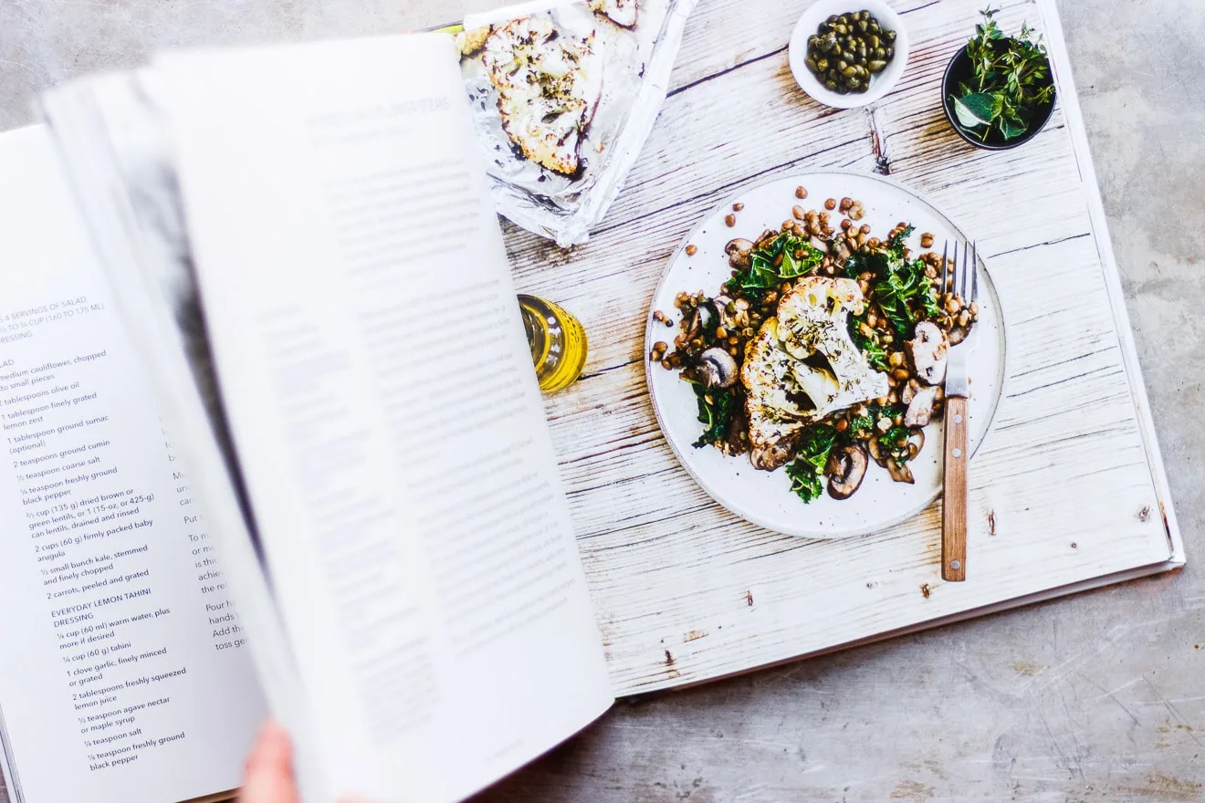 Herbed Cauliflower Steaks with Everyday Lemon Tahini Dressing | Herbed cauliflower steaks with lemon tahini dressing. A simple weeknight meal that is naturally gluten-free, vegan, low-carb and keto-friendly.